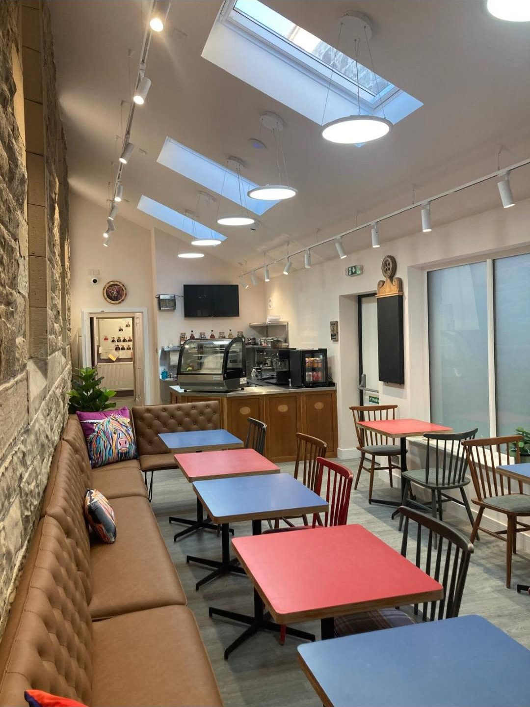 Commercial cafe fit-out with skylights and bespoke seating